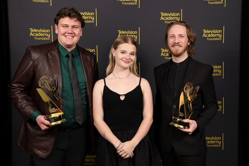 Ashby Florence (center) with Brigham Young University students Connor Van Dyke, from left, and Jaysen Duckworth the Animation Series Award for Love & Gold winners at the 45th College Television Awards presented by the Television Academy Foundation, on Saturday, March 28, 2026, in the Wolf Theatre at the Saban Media Center in Los Angeles.