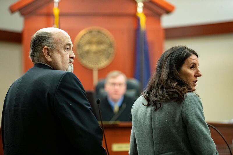 Brent E. Taylor, former director of the Utah Valley Youth Symphony, and his attorney, Cara Tangaro, listen to prosecutors during a hearing before 3rd District Judge Keith Kelly at the Matheson Courthouse in Salt Lake City on Monday, Jan. 7, 2019. Taylor,