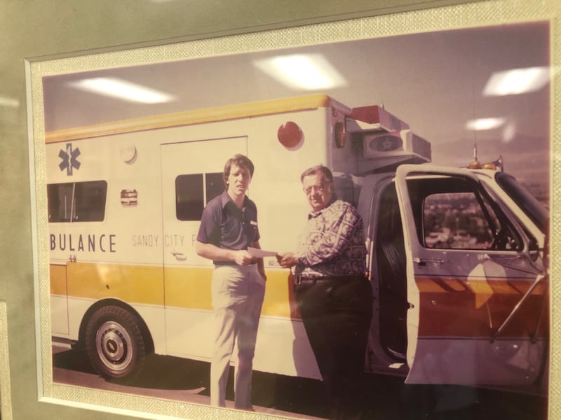 A young Clark Stringham, circa 1977, donates funds to help Sandy purchase an ambulance.