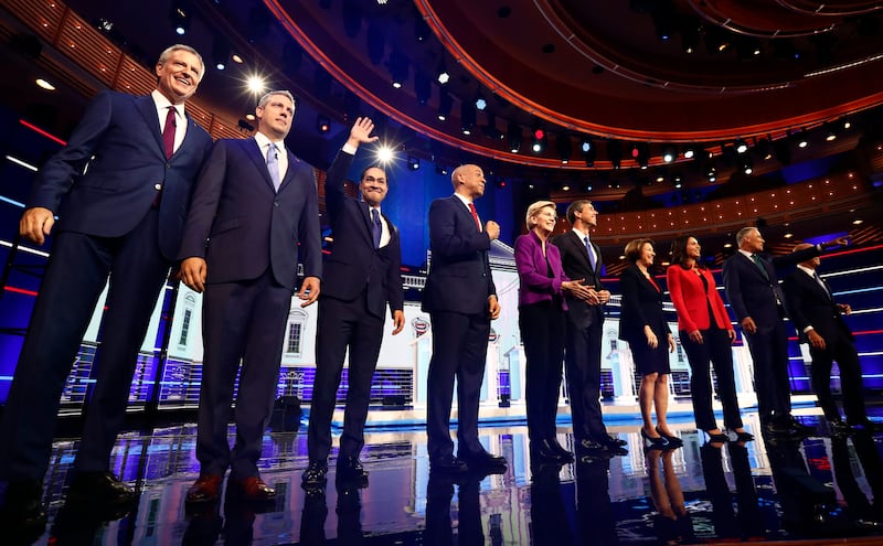 From left, New York City Mayor Bill de Blasio, Rep. Tim Ryan, D-Ohio, former Housing and Urban Development Secretary Julian Castro, Sen. Cory Booker, D-N.J., Sen. Elizabeth Warren, D-Mass., former Texas Rep. Beto O’Rourke, Sen. Amy Klobuchar, D-Minn., Rep