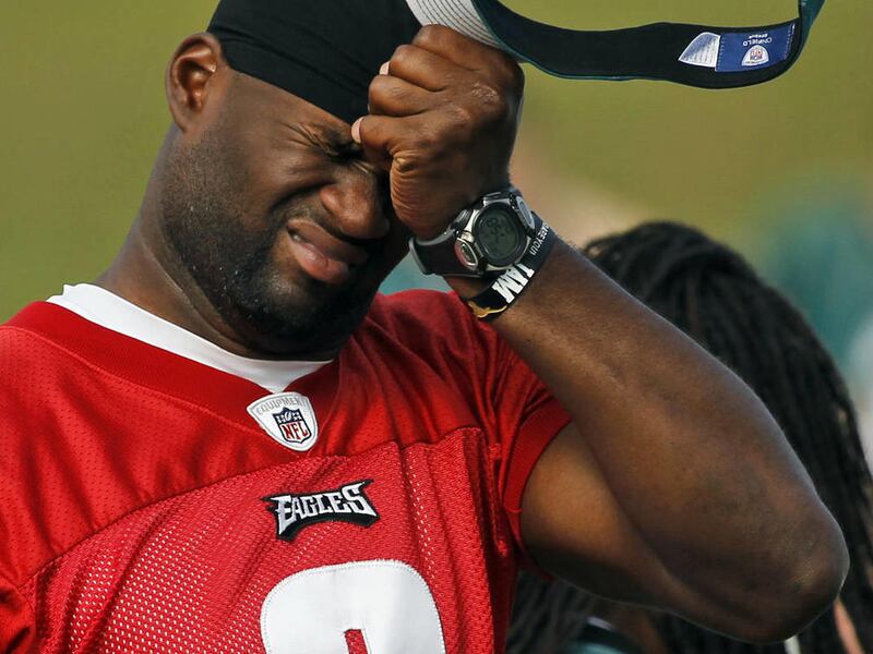 Philadelphia Eagles quarterback Vince Young reacts during NFL football training camp at Lehigh University, Wednesday, Aug. 3, 2011, in Bethlehem, Pa. (AP Photo/Alex Brandon)