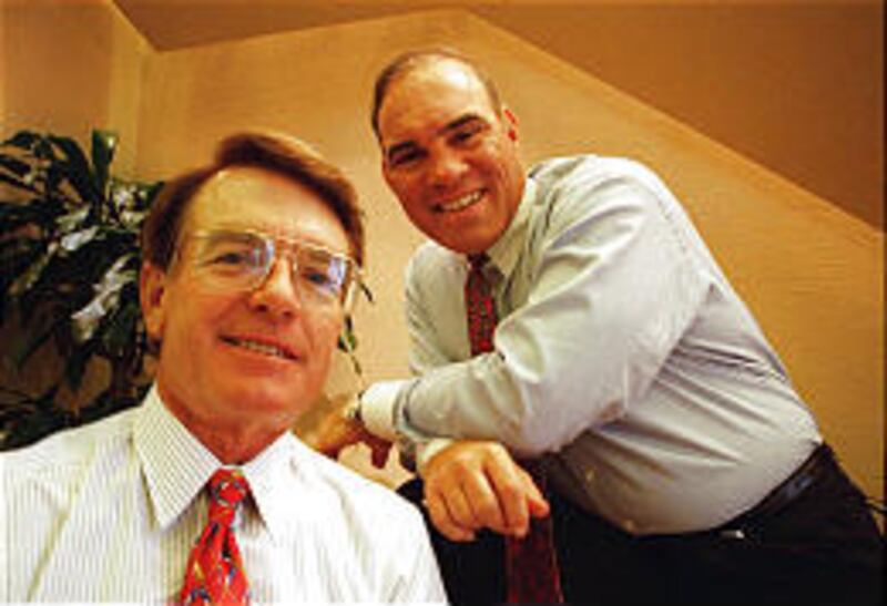 Charles R. Schwab, left, and David Pottruck, shown in 1996, shared the CEO job for five years before Pottruck became sole CEO. The company dumped Pottruck Tuesday.