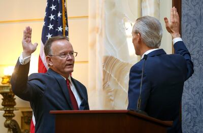 Senate President Stuart Adams, R-Layton, left, is sworn in by former Senate President Wayne Niederhauser, R-Sandy, at the start of the 2019 Legislature at the state Capitol in Salt Lake City on Monday, Jan. 28, 2019.
