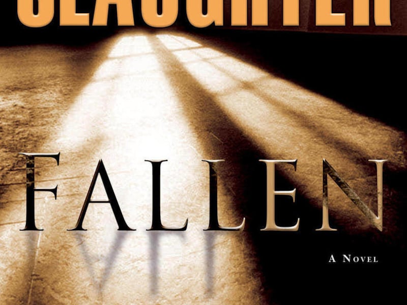 This book cover courtesy of Delacorte shows the cover of "Fallen," by Karen Slaughter. Slaughter delivers another emotion-wracked journey for her characters and readers in "Fallen."
