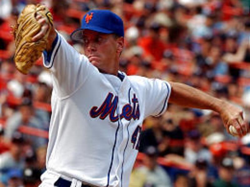 New York pitcher Tom Glavine delivers the ball in the eighth inning Sunday against the Colorado Rockies.