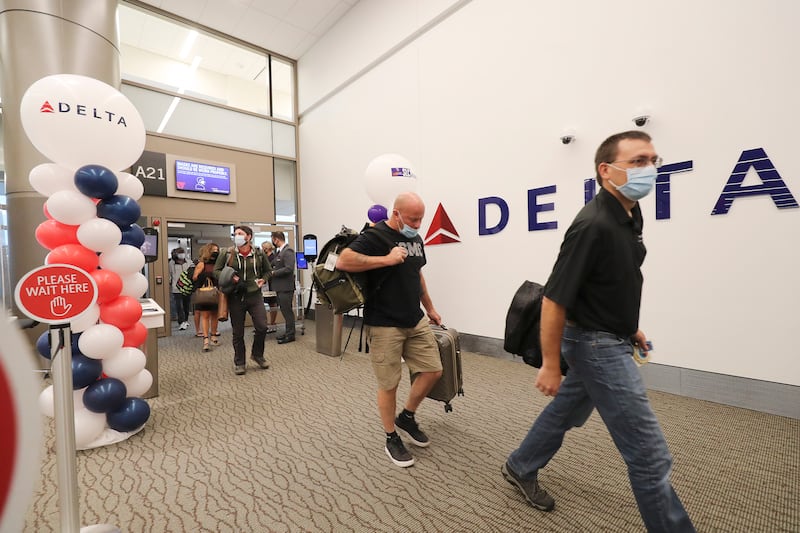 Passengers arrive from Billings, Montana, on the first flight to the new Salt Lake City International Airport in Salt Lake City.