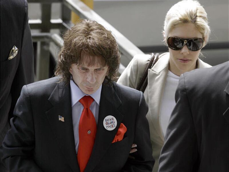 Music producer Phil Spector, left, and his wife Rachelle Spector arrive at Los Angeles County Superior Court Monday to hear the verdict in his murder retrial. He was convicted of second-degree murder in the shooting death of actress Lana Clarkson at his m