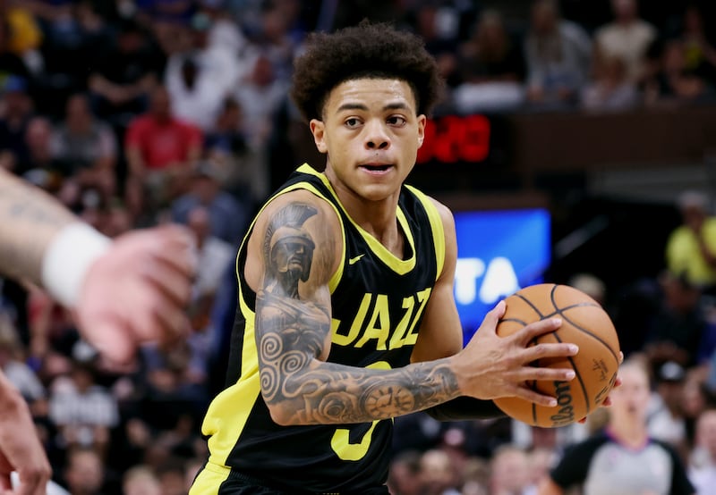 Utah’s Keyonte George holds the ball.