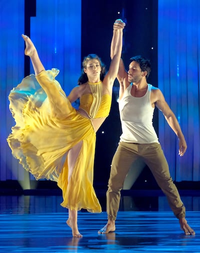 Taylor Sieve, left, and Robert Roldan perform a contemporary routine to “To Make You Feel My Love,” one of the Emmy-nominated numbers choreographed by Mandy Moore on "So You Think You Can Dance."