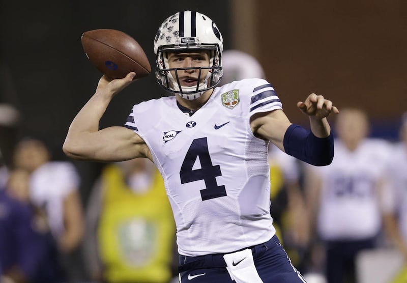 BYU quarterback Taysom Hill during the Fight Hunger Bowl NCAA college football game on Friday, Dec. 27, 2013, in San Francisco.