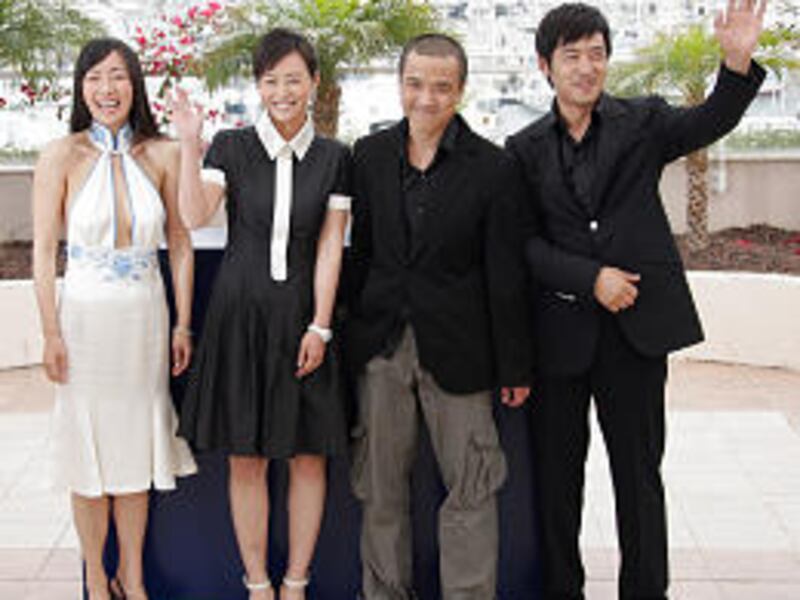 Chinese actors Hu Ling Ling, left, Hao Lei, director Lou Ye and actor Guo Xiaodong attend Cannes fest.