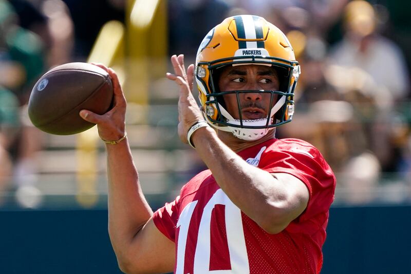 Jordan Love, a back-up quarterback for the Green Bay Packers, throws the ball at practice on July 30, 2022.