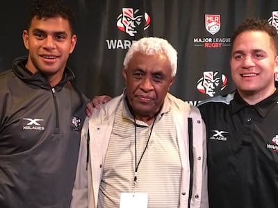Nemani Delaibatiki, center, is pictured with two players on the Utah Warriors Rugby team from Fiji.