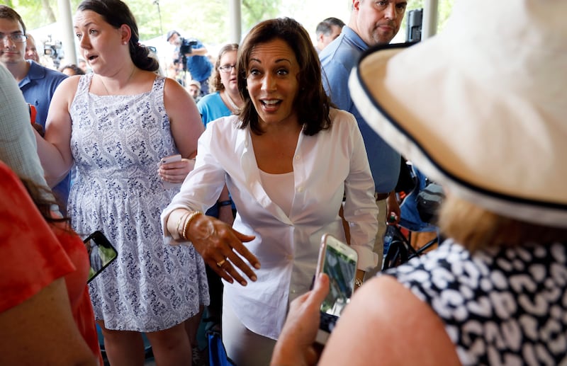 Democratic presidential candidate Sen. Kamala Harris greets local residents during the West Des Moines Democrats' annual picnic, Wednesday, July 3, 2019, in West Des Moines, Iowa. Events in Salt Lake City next week supposedly featuring Harris have been ca