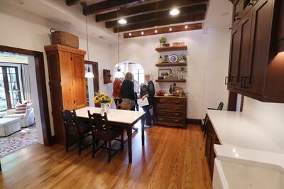 People tour the Gardner home in Millcreek on Friday, Oct. 5, 2018. The home is the oldest Utah residence still standing in its original location. The 1848 home was built by Robert Gardner Jr., who was one of the first settlers to construct a sawmill on Mi