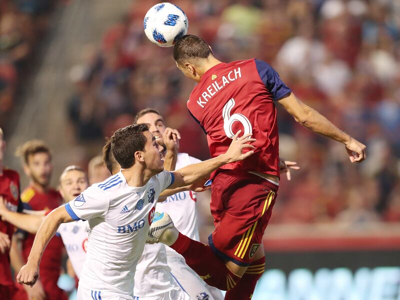 Real Salt Lake midfielder Damir Kreilach (6) heads the ball against Montreal Impact in Sandy on Saturday, Aug. 11, 2018. Real tied Montreal 1-1.