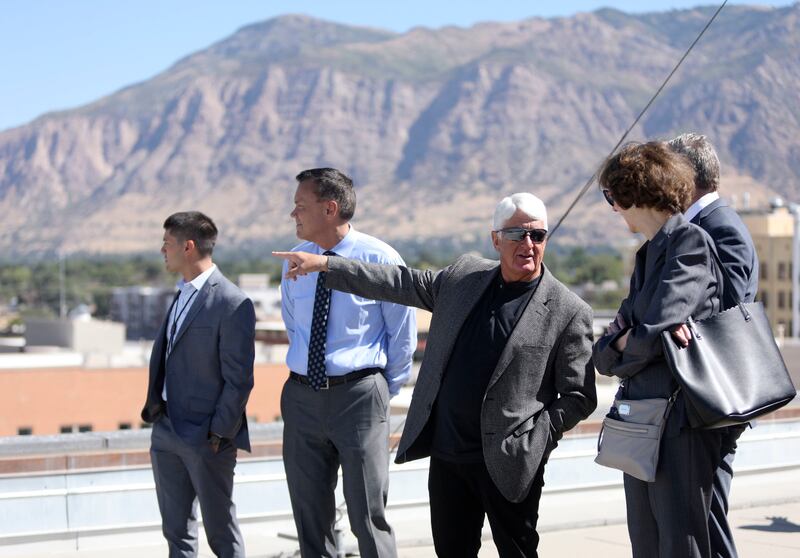 Rep. Rob Bishop talks with Susan Combs, Interior Department's assistant secretary for policy, while touring the roof of the James V. Hansen Federal Building in Ogden on Tuesday, Aug. 28, 2018.