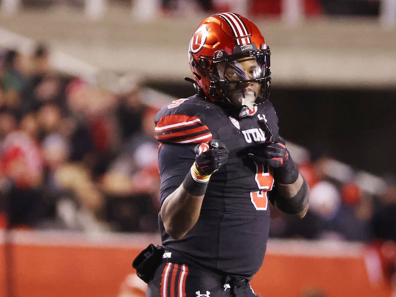 Utah Utes running back Tavion Thomas (9) motions for a first down after long run in Salt Lake City on Saturday, Nov. 12, 2022.