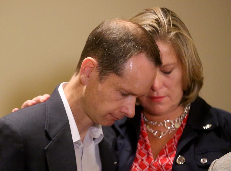 Matt McCluskey and Jill McCluskey embrace during a press conference at the offices of Siegfried and Jensen in Murray on Thursday, June 27, 2019. The McCluskeys are suing the University of Utah for $56 million, alleging the school failed to protect their d