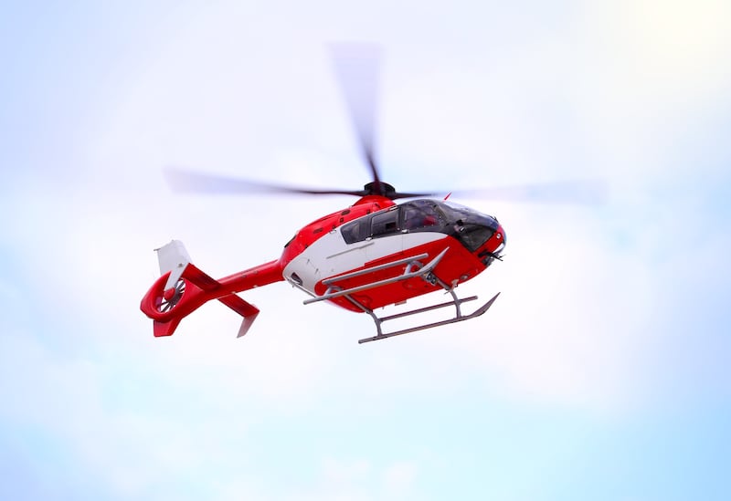 Authorities say search and rescue teams from two states and a police helicopter rescued a man and his 5-year-old son who got stranded on a dark hillside above a cliff while hiking in northwestern Arizona.