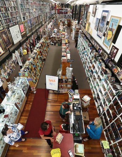 Cindy Eborn, bottom right, helps customers at Eborn Bookstore in Salt Lake City on Thursday, June 13, 2019. Cindy and her husband, Bret Eborn, are closing their downtown location at the end of the month after being evicted from the David Keith Building. T