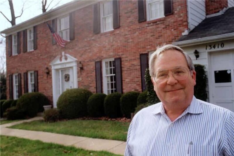 Retired government employee Alton Bradford of Rockville, Md., stands in front of his refinanced home April 6, 2001. Bradford took advantage of lower interest rates, and estimates he's been able to reduce his monthly mortgage payments by several hundred do