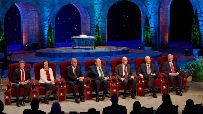 President Timothy L. Farnes, President Susan H. Porter, Elder Patrick Kearon, President Jeffrey R. Holland, President Henry B. Eyring, President Dallin H. Oaks, and President D. Todd Christofferson, sit in a row during the First Presidency's Christmas Devotional broadcast on Sunday, Dec. 7, 2025.