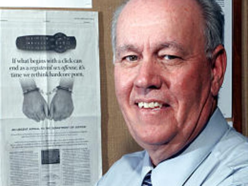 Conservative activist Phil Burress stands by a full-page anti-porn ad.