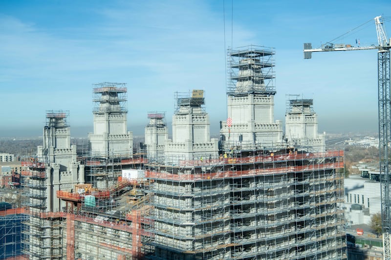 Workers remove and catalogue stone for repair and restoration on the eastern towers and walls of the Salt Lake Temple.