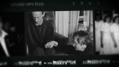 Sister Linda Bellemore of the Sisters of the Holy Cross comforting an HIV patient.