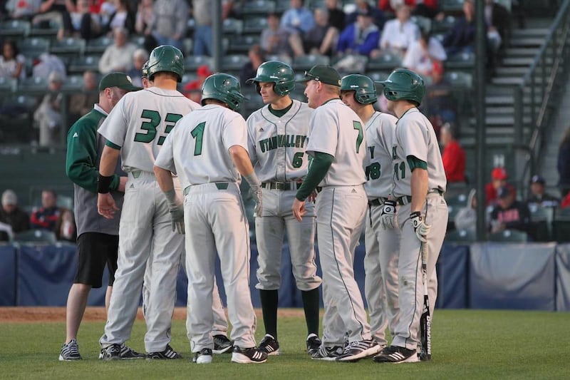 UVU baseball coach Eric Madsen (7) instructs his team in a game at Arizona in February. Madsen signed a contract extension to remain at Utah Valley through the 2016 season.