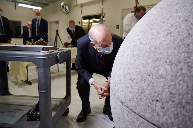 President Russell M. Nelson looks inside the capstone of the Salt Lake Temple on May 20, 2020.