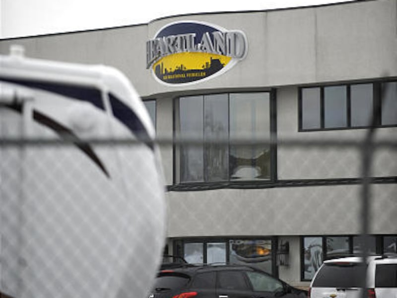 In this photo taken Nov. 18, 2009, recreational vehicles are ready sales at International RV World in Elkhart, Ind.