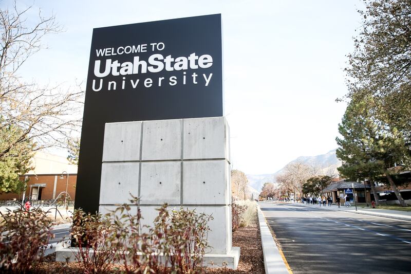 A sign greets visitors to the campus of Utah State University in Logan on Nov. 14, 2019.