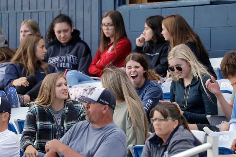 In this June 16, 2020, file photo, Yakima Valley Pepsi Pak baseball fans crowd together to watch the Senior Legion team play a game in Selah, Wash.
