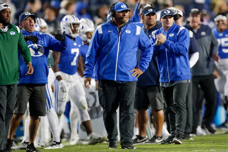 BYU coach Kalani Sitake walks on the field during a timeout while playing East Carolina Friday, Oct. 28, 2022, in Provo.