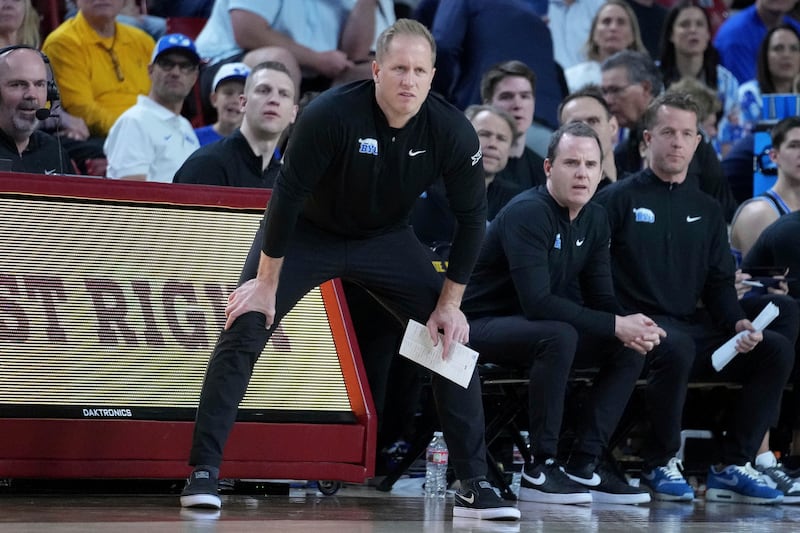 BYU head coach Kevin Young watches his team against Arizona State during the second half of a game Wednesday, Feb. 26, 2025, in Tempe, Ariz.