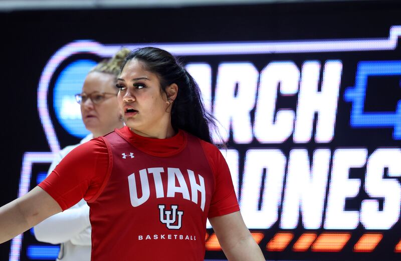 Utah’s Alissa Pili and coach Lynne Roberts attend practice at the Jon M. Huntsman Center in Salt Lake City, March 16, 2023.