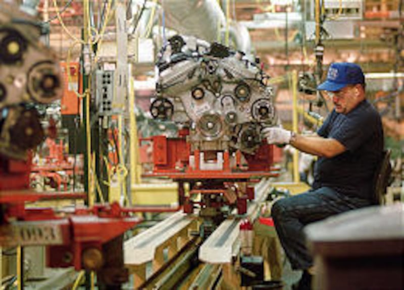 Ron Yankovitz works on an engine at the plant in Brook Park, Ohio.