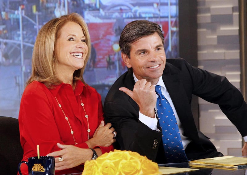 In this photo provided by the ABC Television Network, Katie Couric, left, co-hosts with George Stephanopoulos on “Good Morning America,” Monday, April 2, 2012, at the ABC studio in New York. A guest reporter on the show was caught without pants on during a video call in segment.