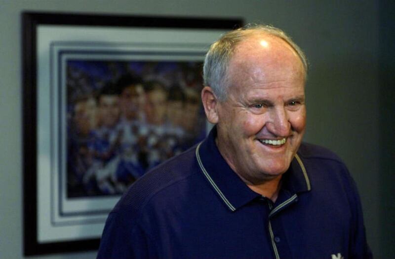 BYU football coach LaVell Edwards jokes with members of the media prior to the announcement of his retirement at a press conference at Cougar Stadium in Provo in 2000.