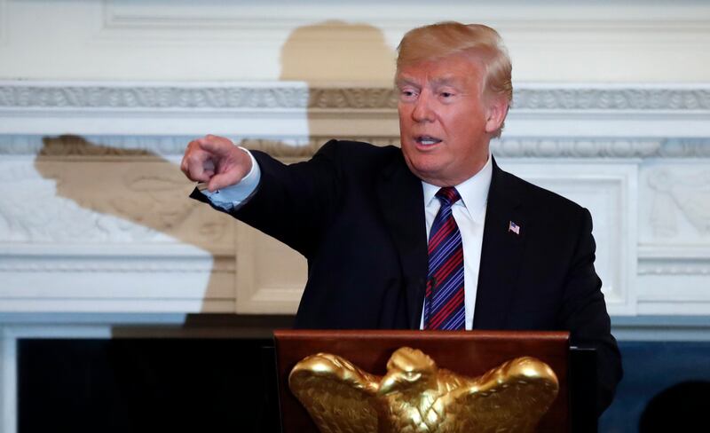 President Donald Trump speaks during a dinner for evangelical leaders in the State Dining Room of the White House, Monday, Aug. 27, 2018, in Washington. (AP Photo/Alex Brandon)
