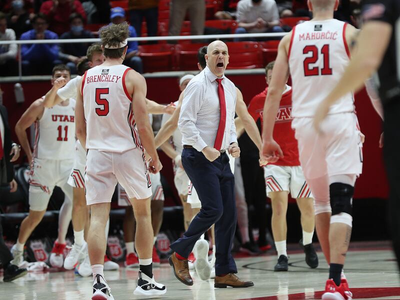 Utah Utes head coach Craig Smith celebrates after a Ute defensive stand against UCLA in Salt Lake City.