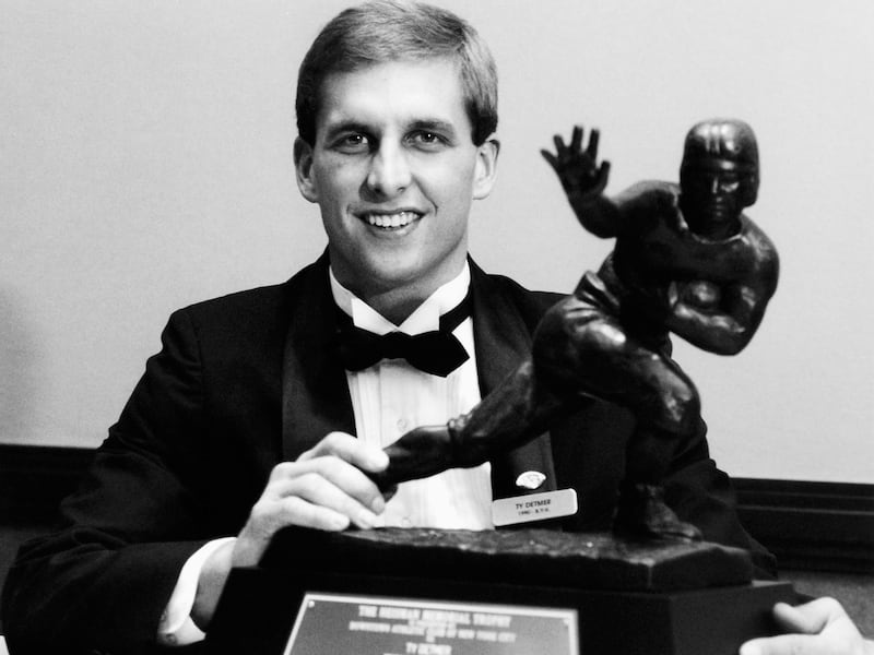Ty Detmer, shown here with the Heisman Trophy he won, was named the winner of the Maxwell Club Award in Philadelphia.
