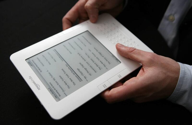 In this Feb. 9, 2009 file photo, the Kindle 2 electronic reader is shown at an Amazon.com news conference in New York. Apple\'s new touch-screen \"tablet\" computer, expected to be unveiled Wednesday, Jan. 27, 2010, could give publishers the alternative t