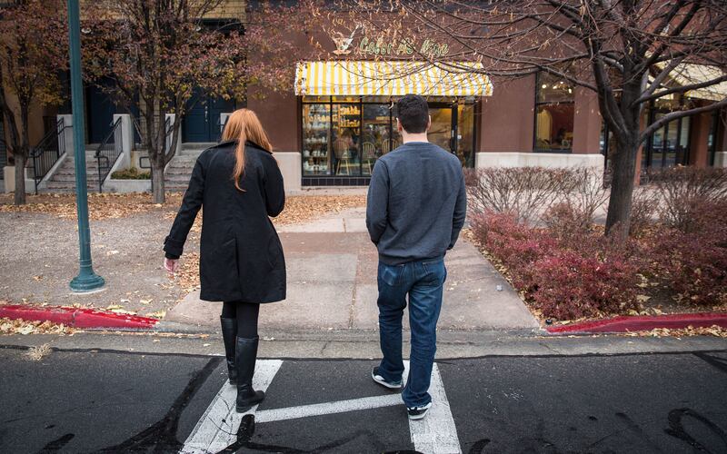 Daniel Vela and Becca Woods walk together after their date in Provo on Saturday, Nov. 17, 2018.