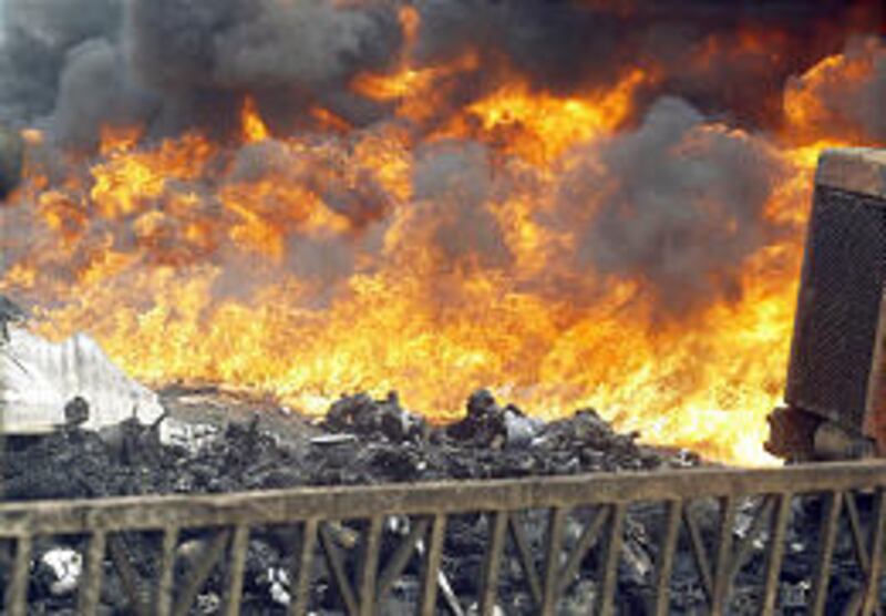 Flames soar high in Lagos' Abule Egba neighborhood after a gasoline line ruptured by vandals exploded on Tuesday.