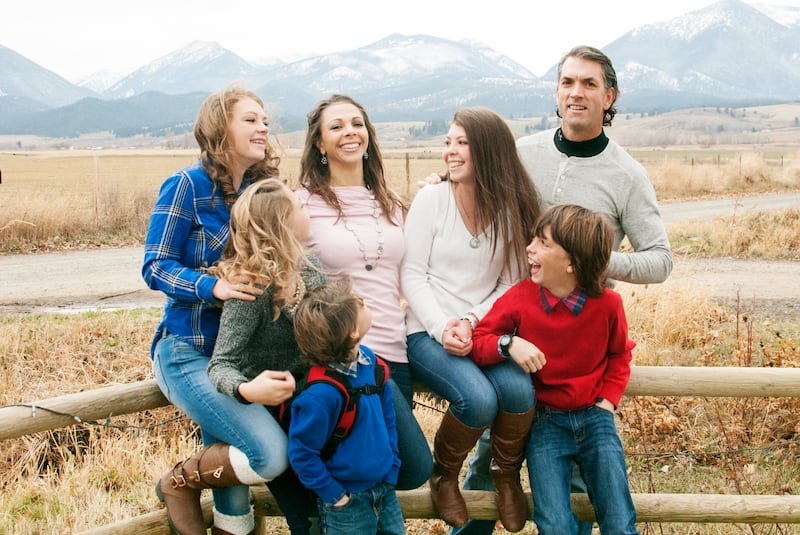 Stacy and Jason Bingham are pictured with their five children. Three of their kids have had heart transplants —the oldest daughter has had two.