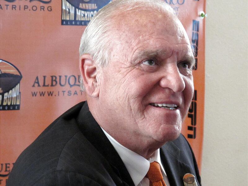 UTEP coach Mike Price smiles during a news conference.