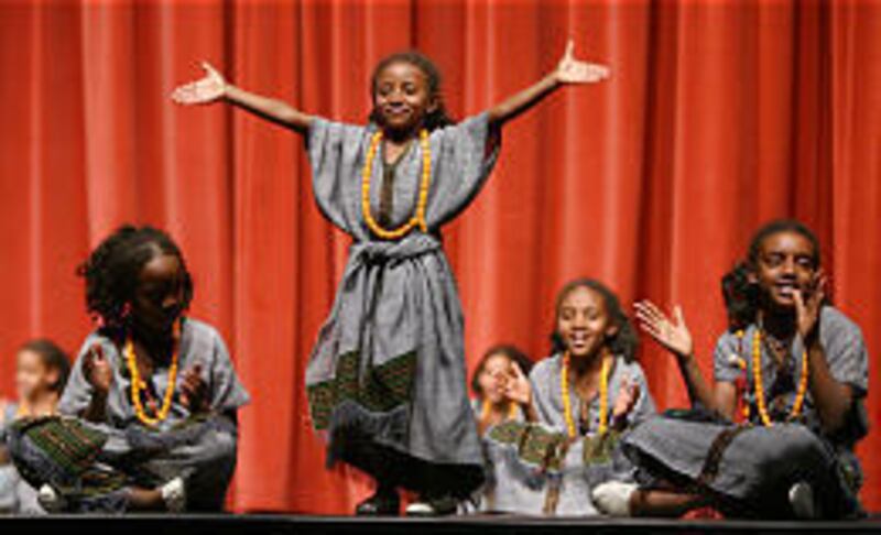 The Mesgana Dancers performs at Murray High School. The group was founded by a Utah couple.